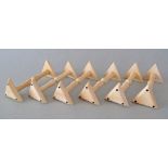 A group of six late 19th / early 20th century carved ivory knife rests, with geometric designs