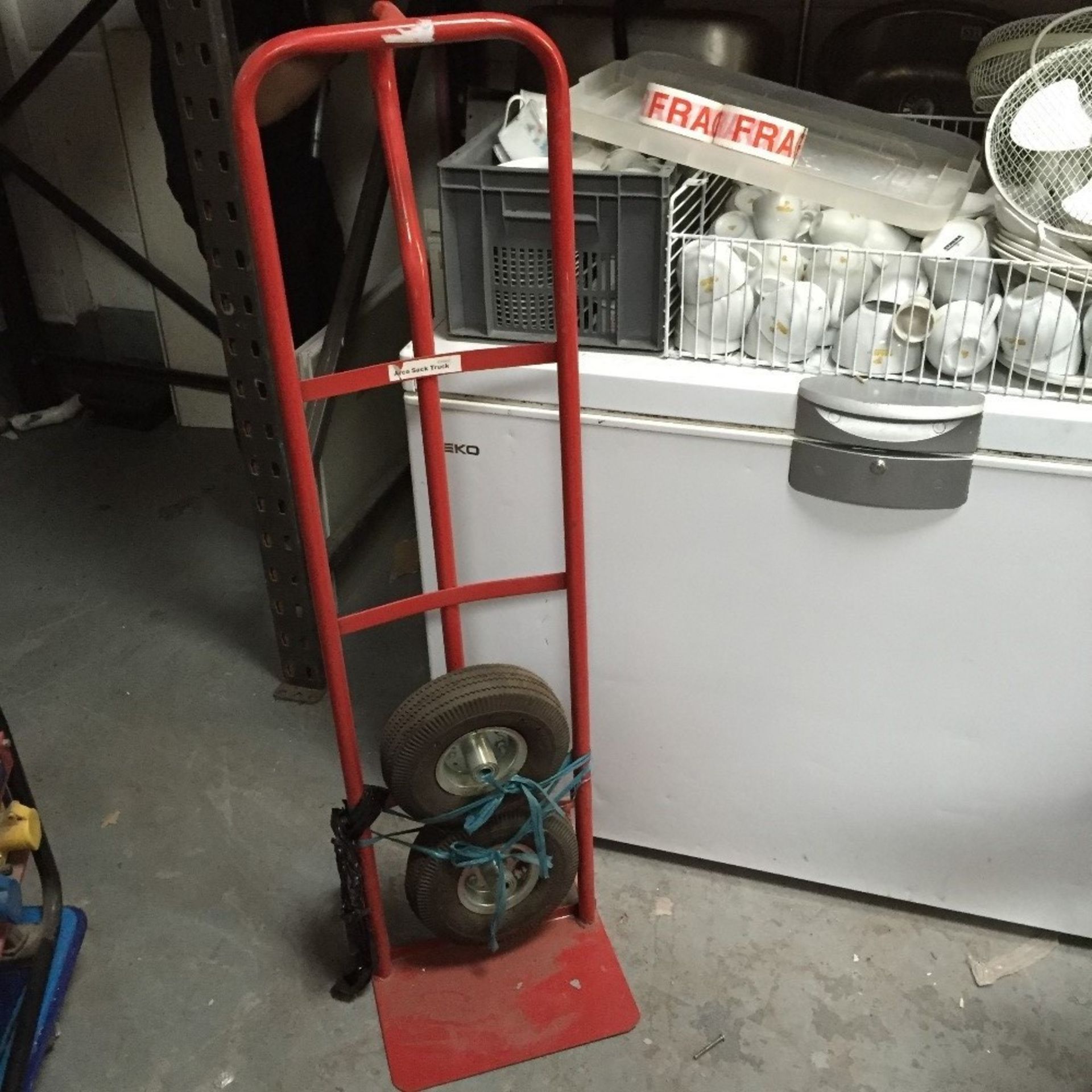 Pallet truck requires wheel bar Located in Cheltenham