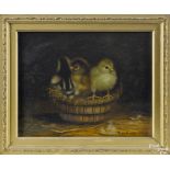 Ben Austrian (American 1870-1921), oil on canvas of three chicks in a rye straw basket, signed lower