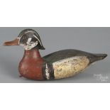 Carved and painted wood duck decoy, mid 20th c., 13 1/2" l. Original paint with losses