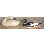 Pat Porterfield, three signed miniature decoys, 20th c., to include a pair of mergansers and a swan,
