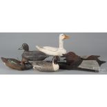 Three carved and painted duck decoys, 20th c., a blue wing teal with later signed inscription Paul