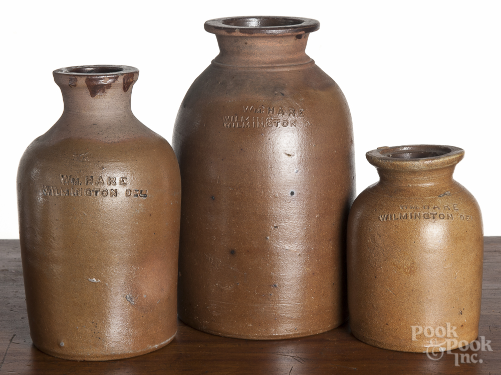 Delaware stoneware bottles, 19th c., impressed Wm. Hare Wilmington Del., 9 1/4" h., 8" h., and 5 3/