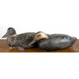 Two carved and painted duck decoys, mid 20th c., one is attributed to Wildfowler with a balsa