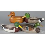 Four carved duck decoys, signed Bob Wohlson, 20th c., largest - 15 3/4". Overall good condition.