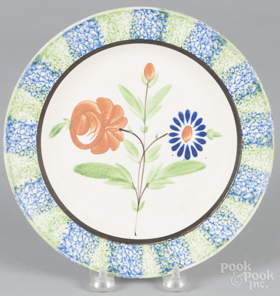 Blue and green spatterware plate, 19th c., with unusual floral decoration, 8 1/2" dia. Very small