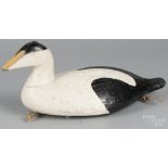 Carved and painted eider duck decoy, mid 20th c., 17 1/2" l. Old working repaint.  CLICK HERE TO BID