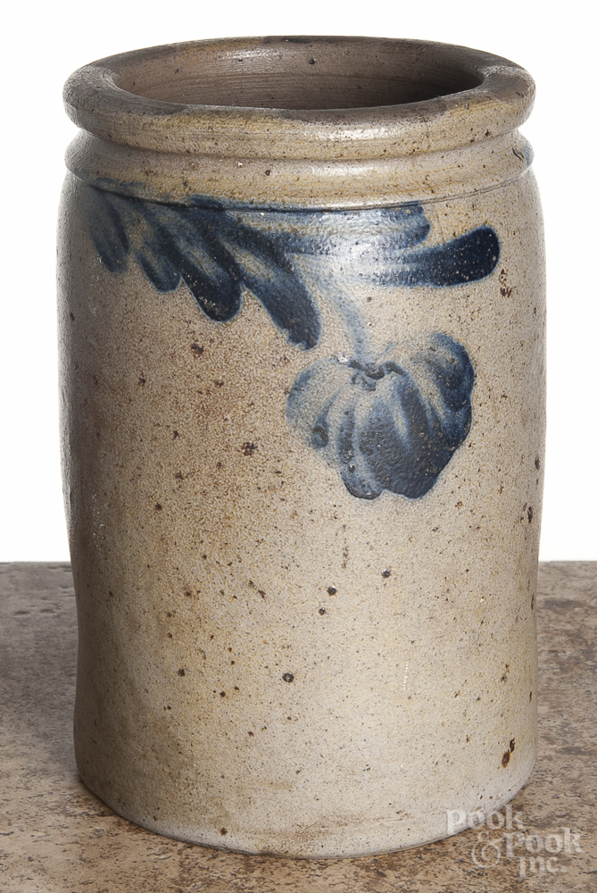 Two Pennsylvania stoneware jars, 19th c., with cobalt decoration, 8 1/4" h. Flower - 3" hairline.