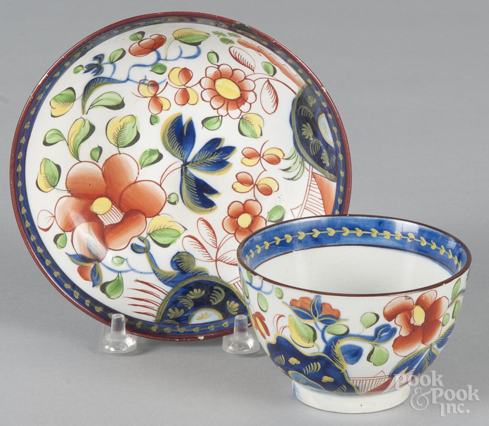 Gaudy Dutch porcelain single-rose cup and saucer, 19th c. Saucer - 1/4" chip to base rim, tiny glaze
