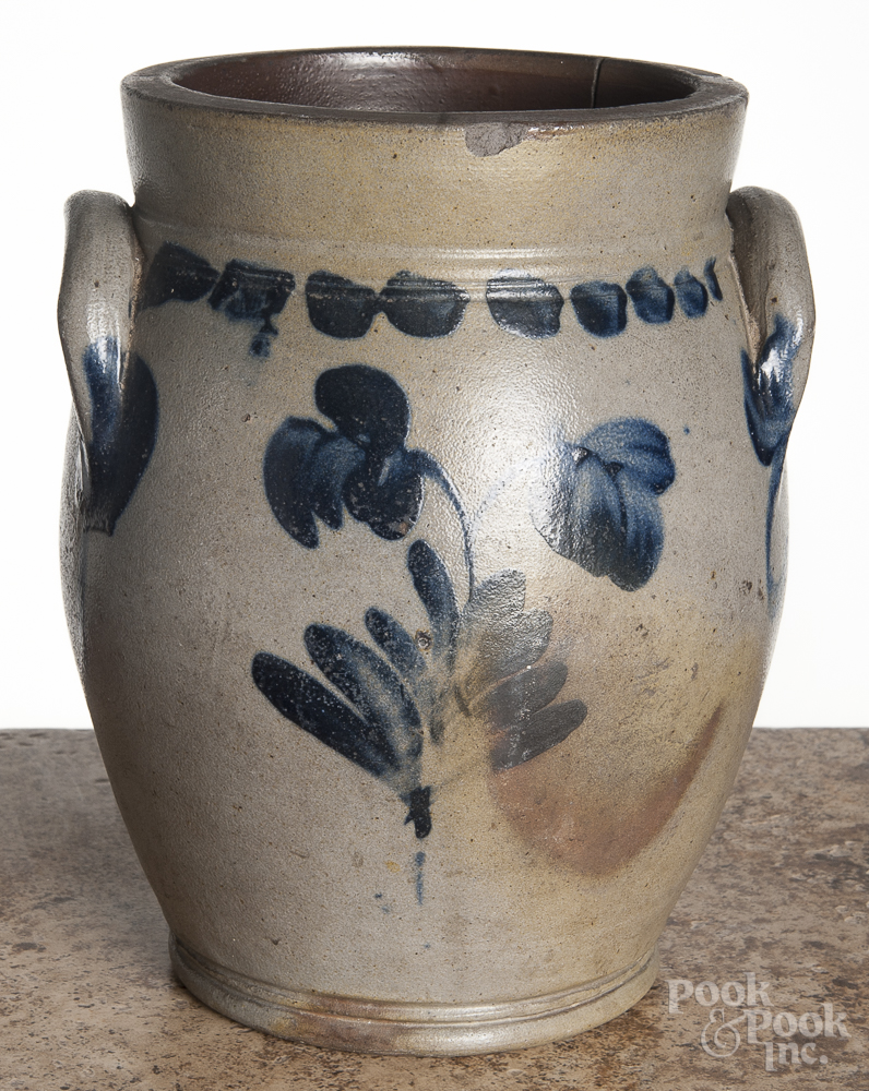 Pennsylvania stoneware crock, 19th c., with vibrant cobalt floral decoration on each side, 9 3/4" h.