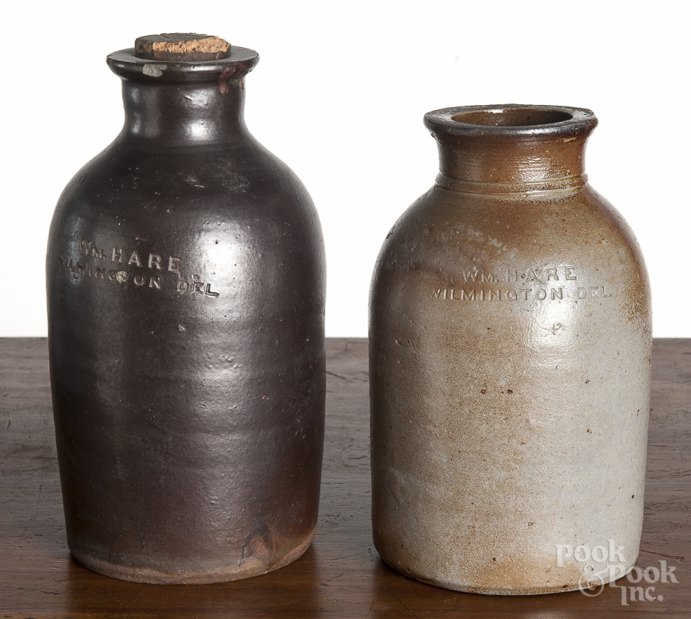 Two Delaware stoneware jars, 19th c., impressed Wm. Hare Wilmington Del., 7 1/2" h. and 8 1/2" h.