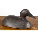 Two carved and painted duck decoys, mid 20th c., the canvasback attributed to Michigan, 15" l. and