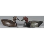 Pair of Prince Edward Island carved and painted redhead duck decoys, mid 20th c., 15 1/4" l.