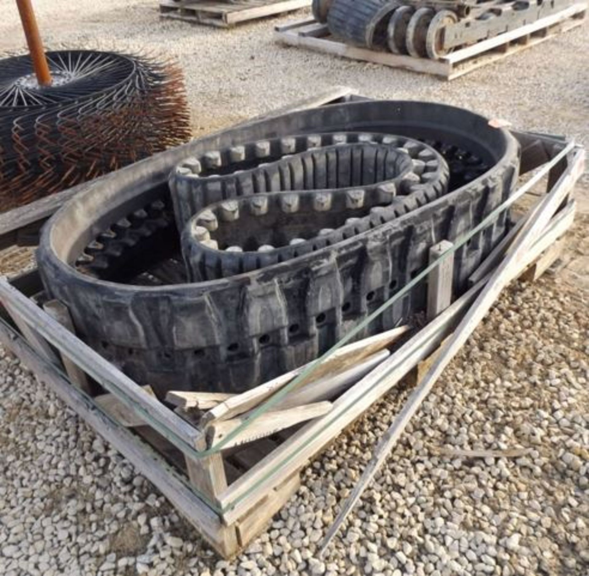 (Lot 604)  PALLET OF USED TRACKS PALLET OF RUBBER 1 ASV PT60 AND 1 CASE 440CT