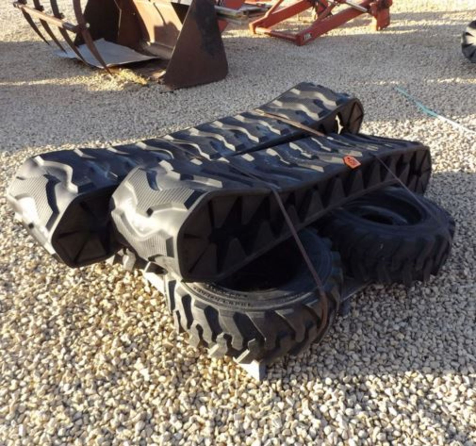 (Lot 624)  (NEW  RUBBER TRACK SYSTEM WITH TIRES & RIMS, FITS BOBCAT 763 SKID LOADER