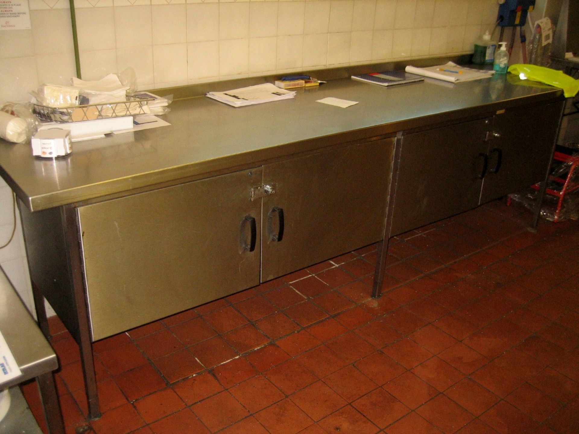 Stainless steel preparation table 2900mm x 700mm with 2 double door cabinets under (Lift out £10)