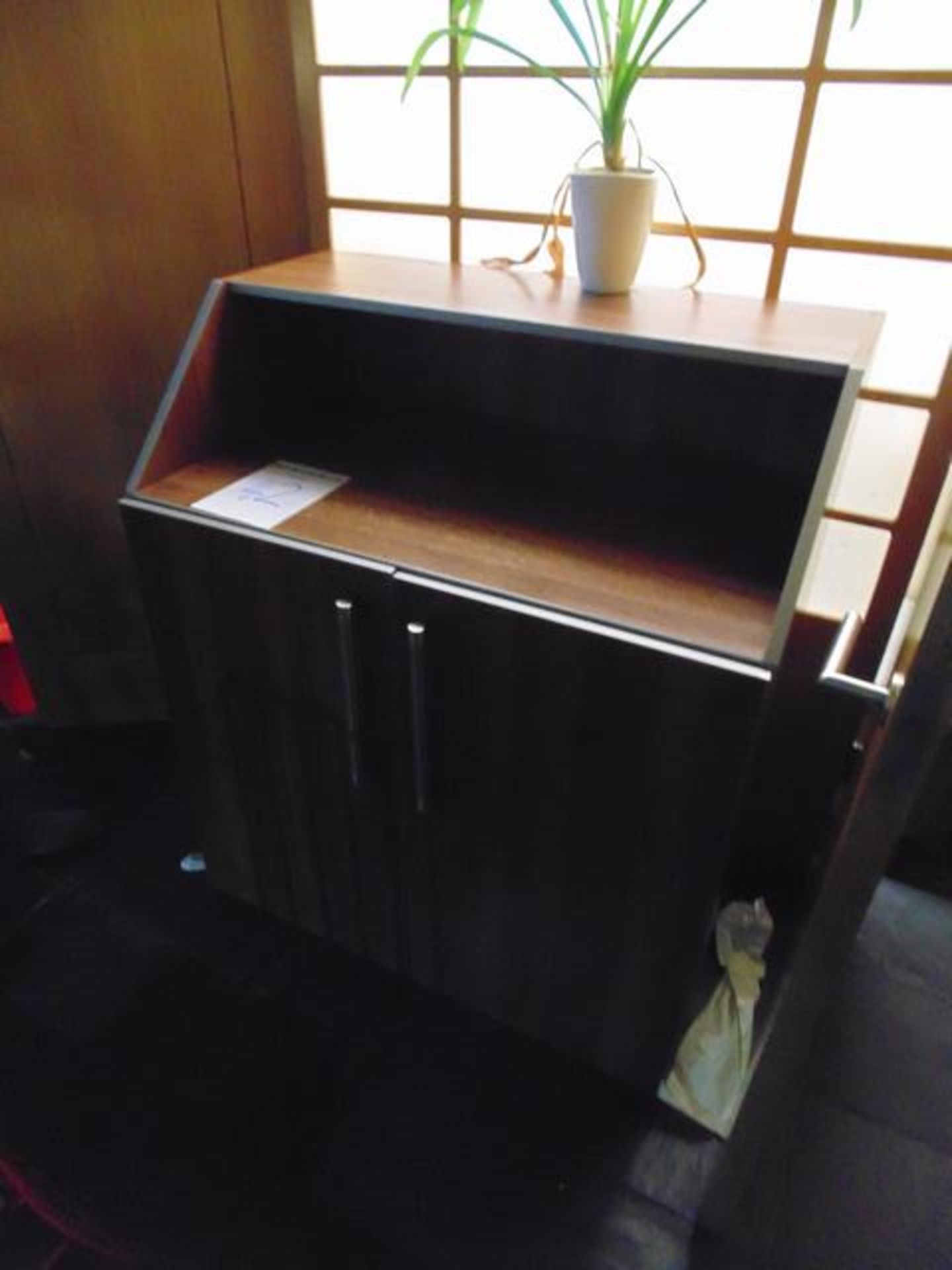 A wooden Maitre D station reception desk with two door cupboard under 1000mm x 630mm x 1200mm