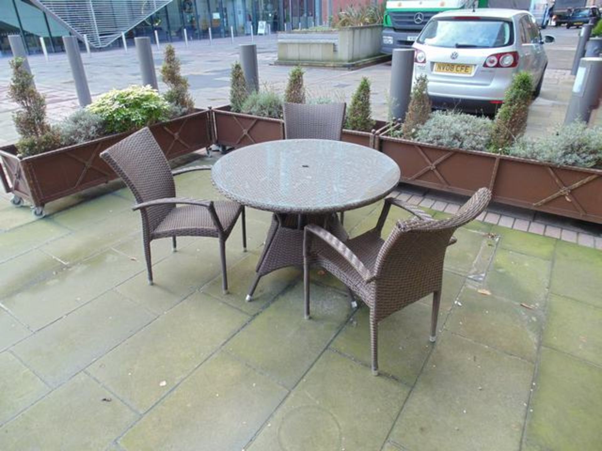 Rattan 1100mm glass top table complete with three chairs