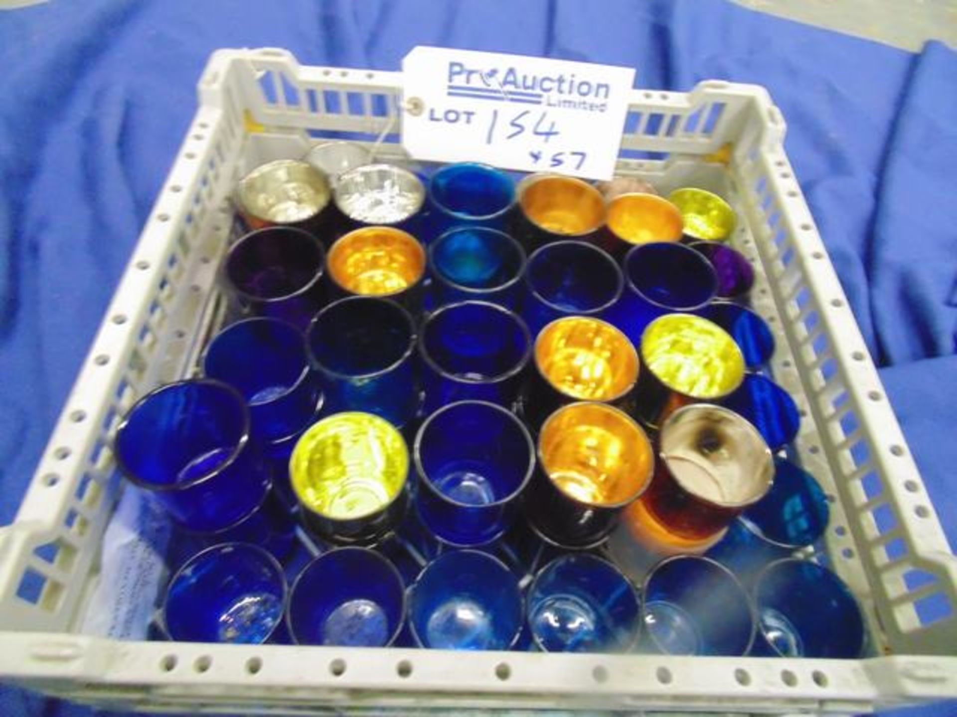 57 x Various coloured tealight holders