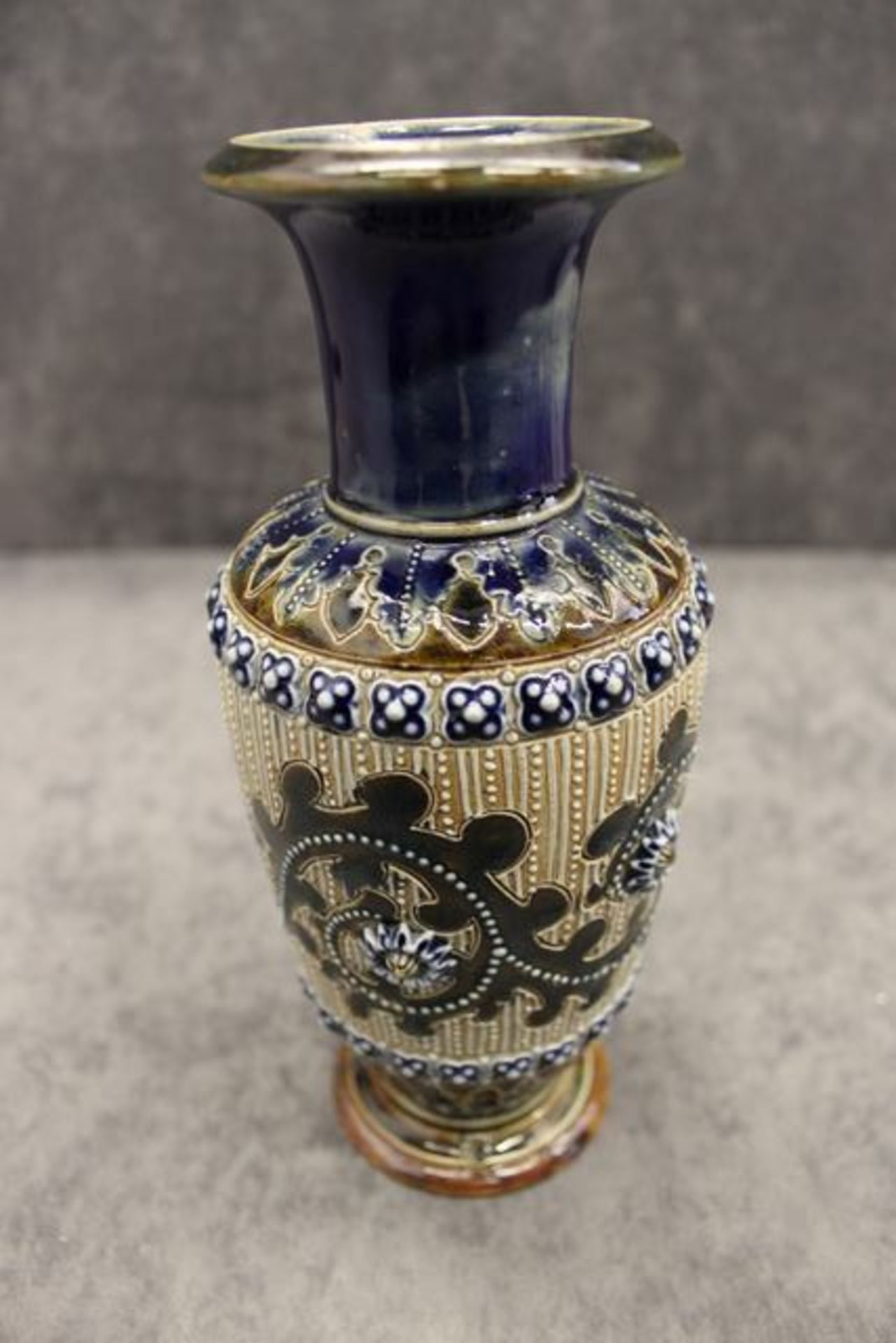 George Tinworth (British, 1843 - 1913) for Doulton Lambeth stoneware vase, dated 1876, scrolling