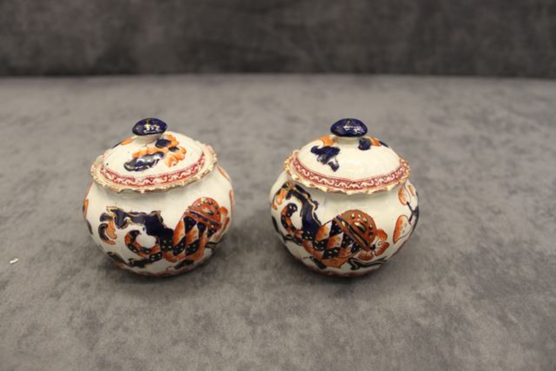 A pair of Royal Doulton lidded pots, decorated in cobalt blue & burnt orange with gilt highlighting, - Image 4 of 4