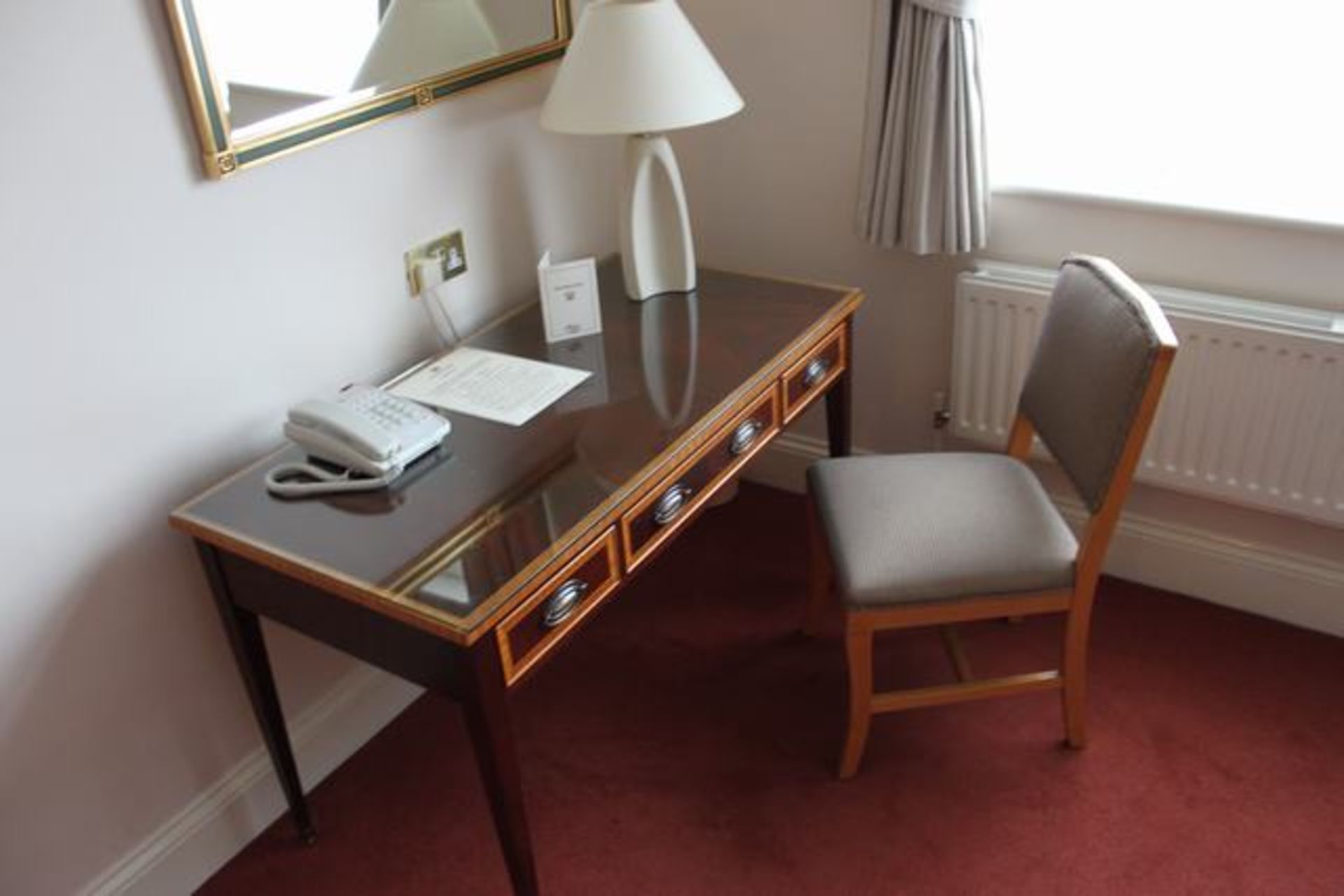 An Edwardian style three drawer writing desk 1200mm x 600mm x 730mm complete with side chair