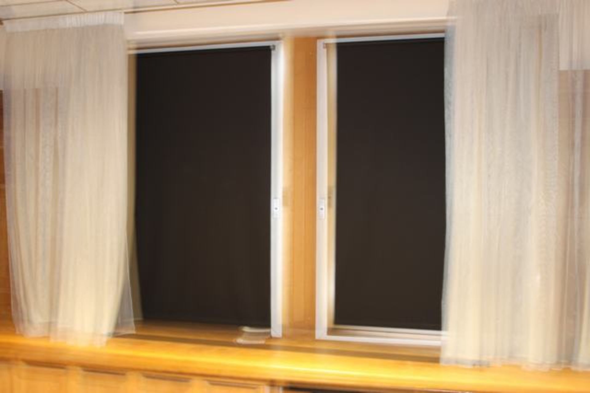 A pair of roller black out blinds 1100mm x 1700mm >>Lift out charge  5