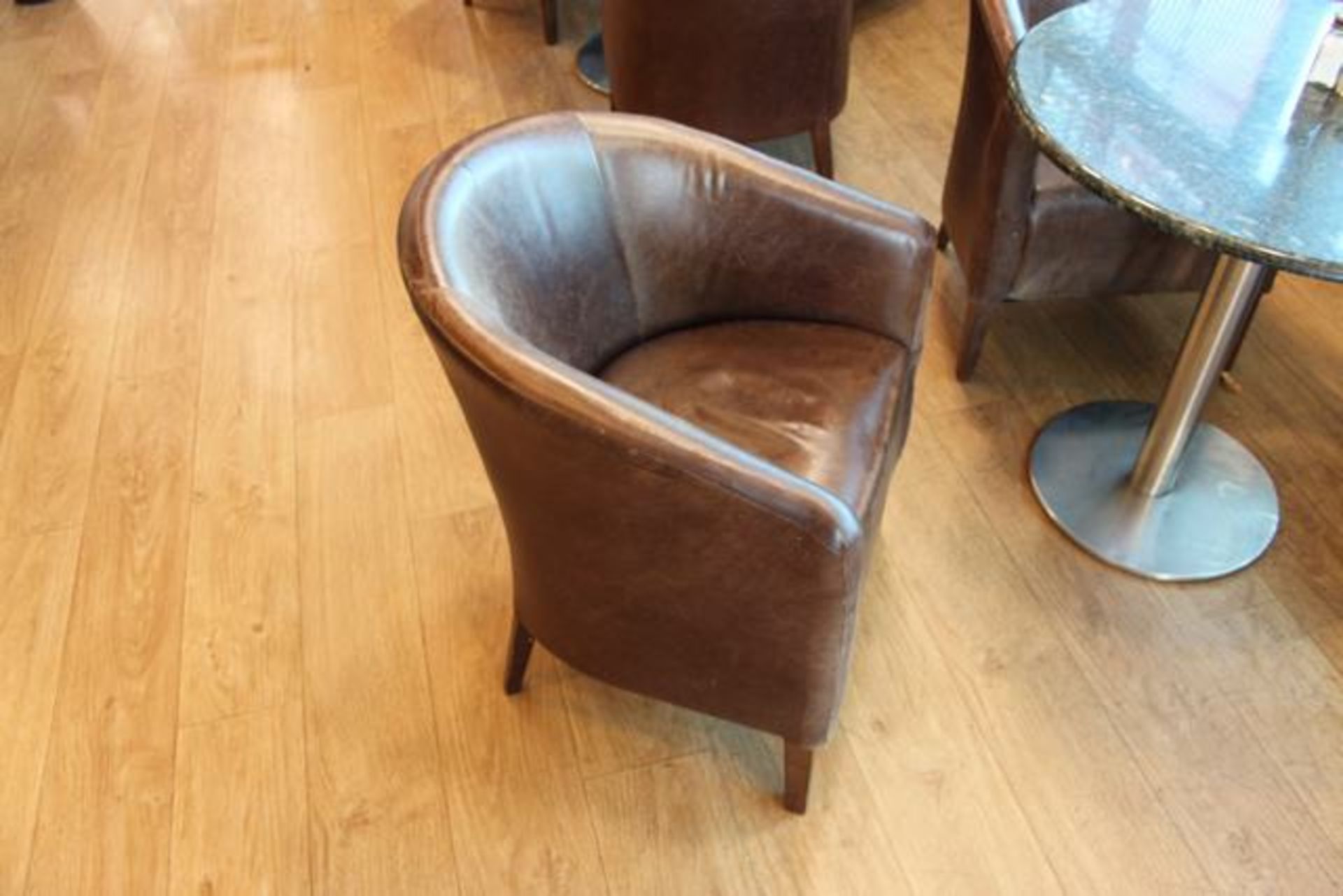 3 x Brown leather tub chairs 420mm pitch