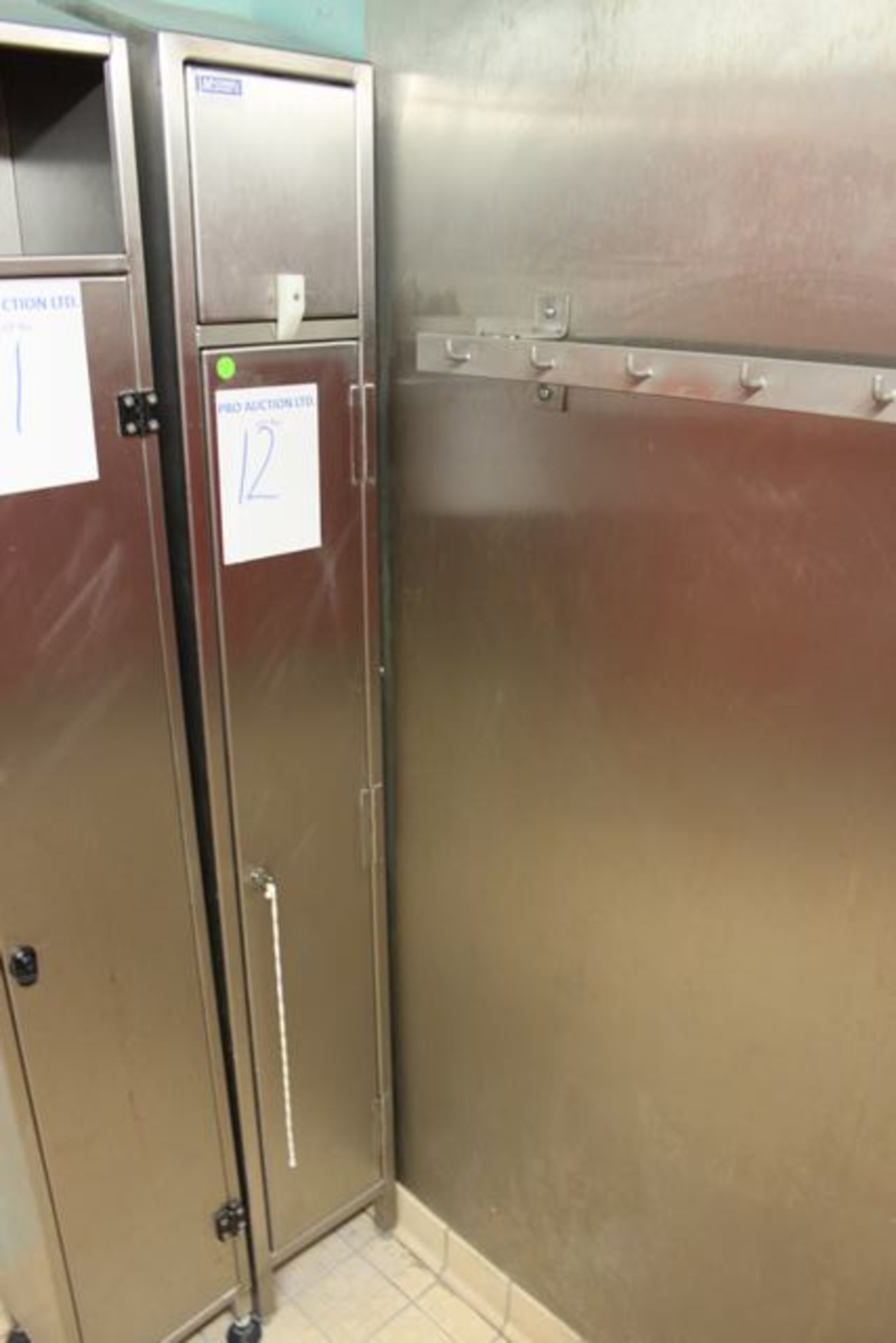 Mc Connell stainless steel single door with a post-box hole overall garment collector locker 381mm x