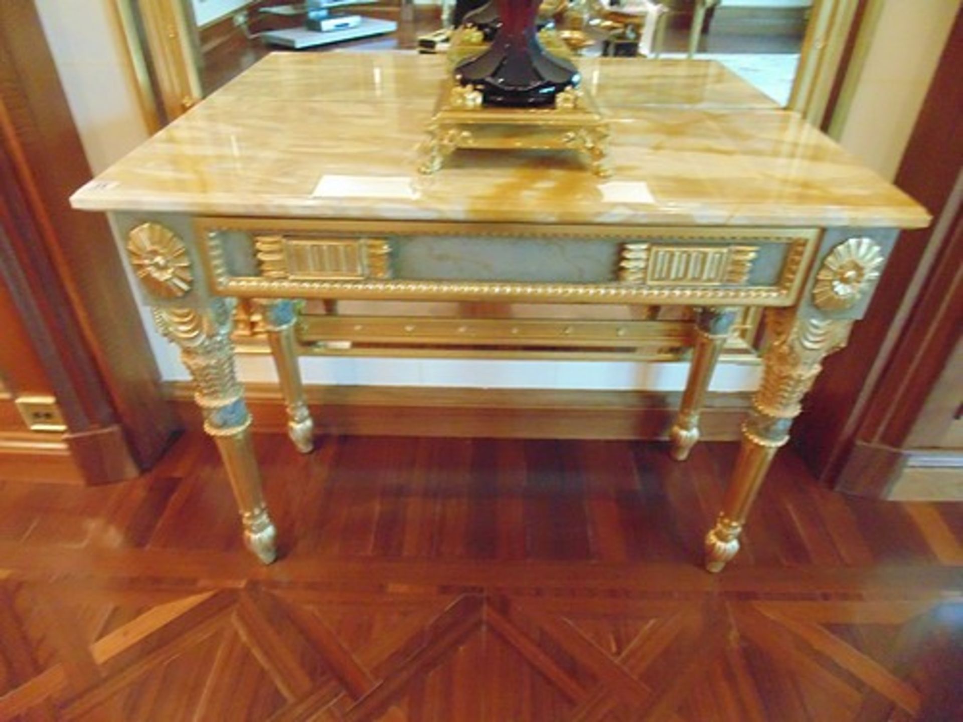 Neoclassical Italian painted and parcel gilt console with marble top, applied medallions detail on