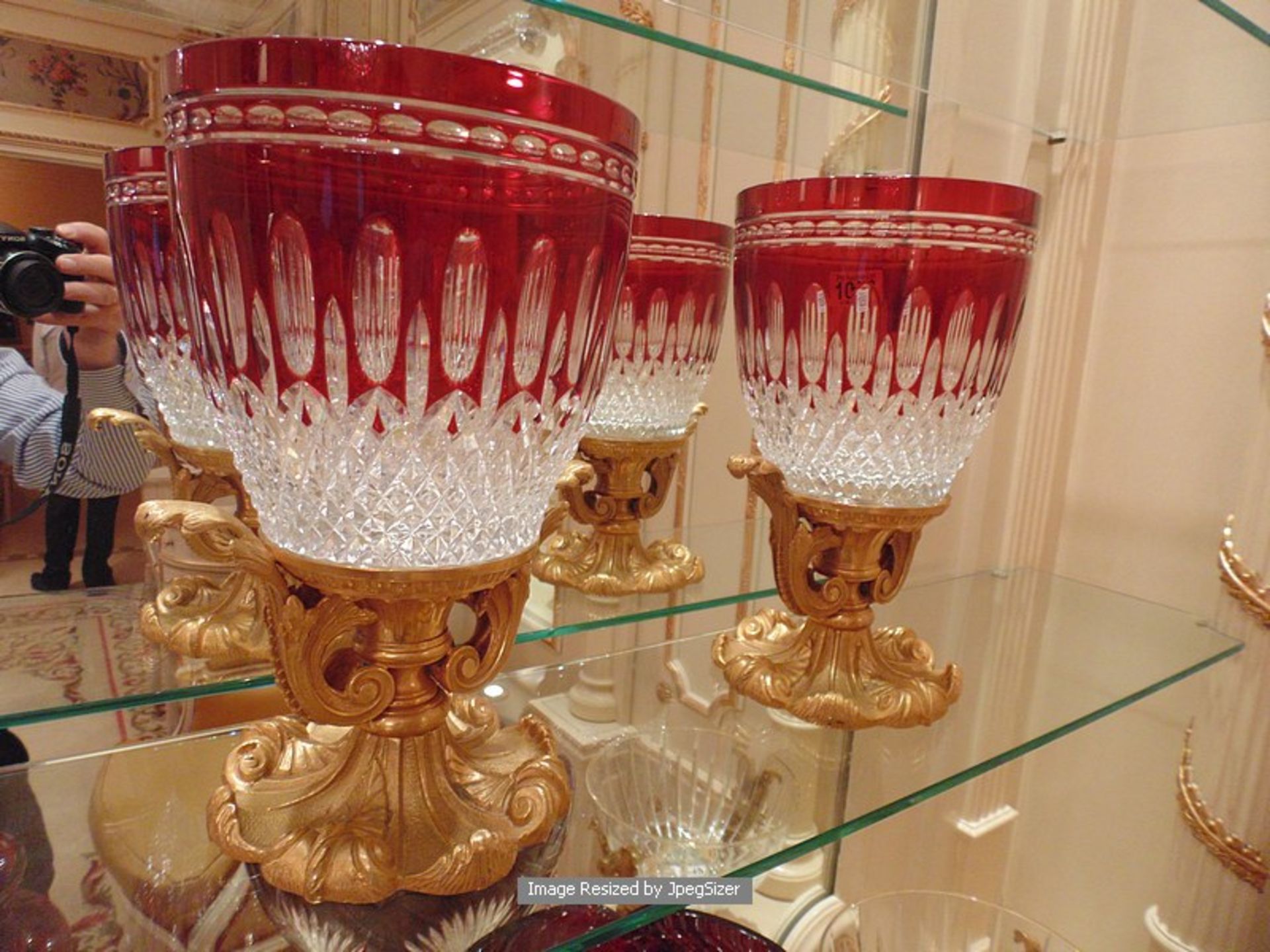 A pair of Baldi Home Jewels stunning ruby red and clear crystal vases mounted on bronze figural - Image 3 of 3