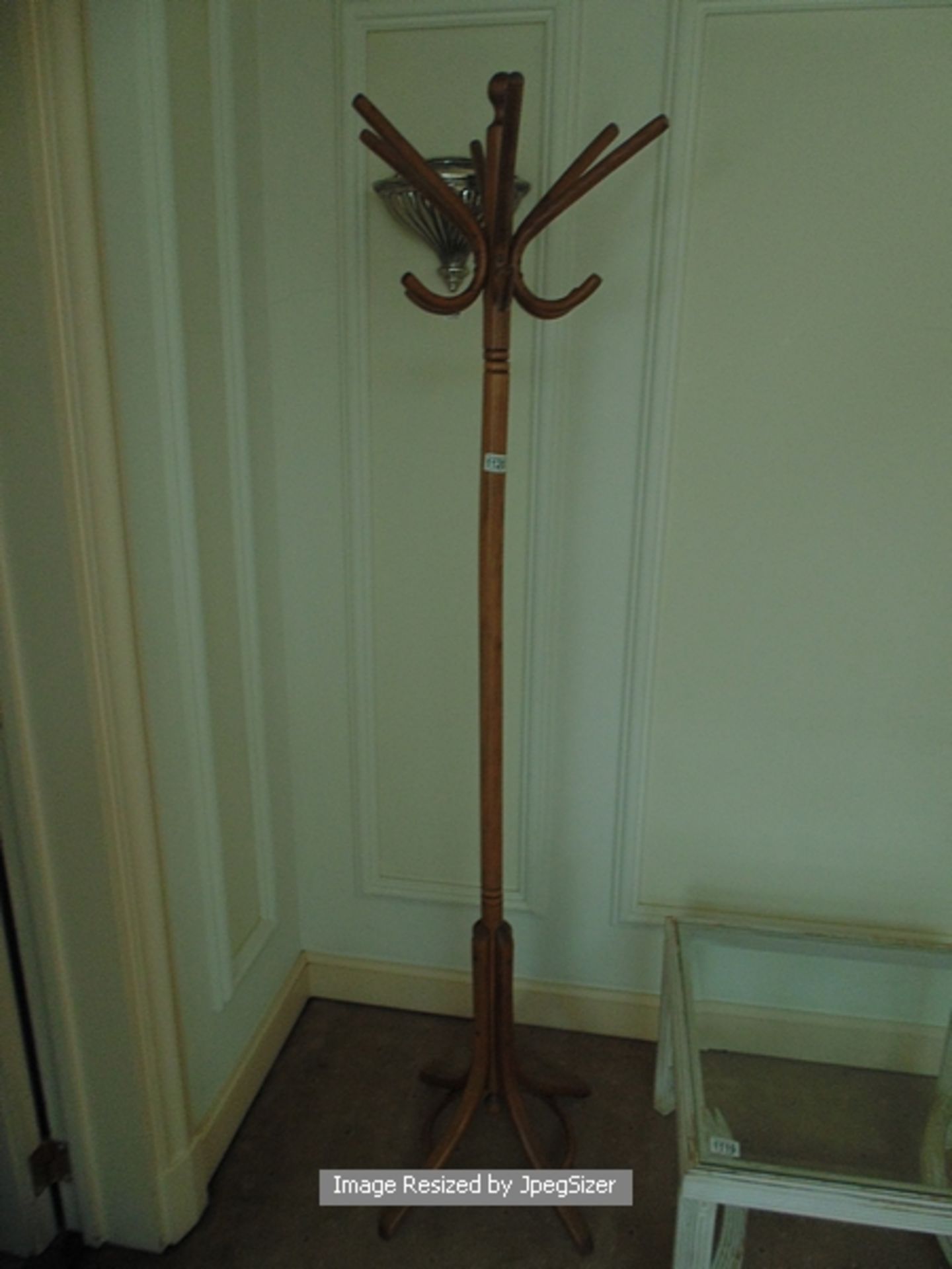 A mahogany coat stand with a six crown top 1900mm tall