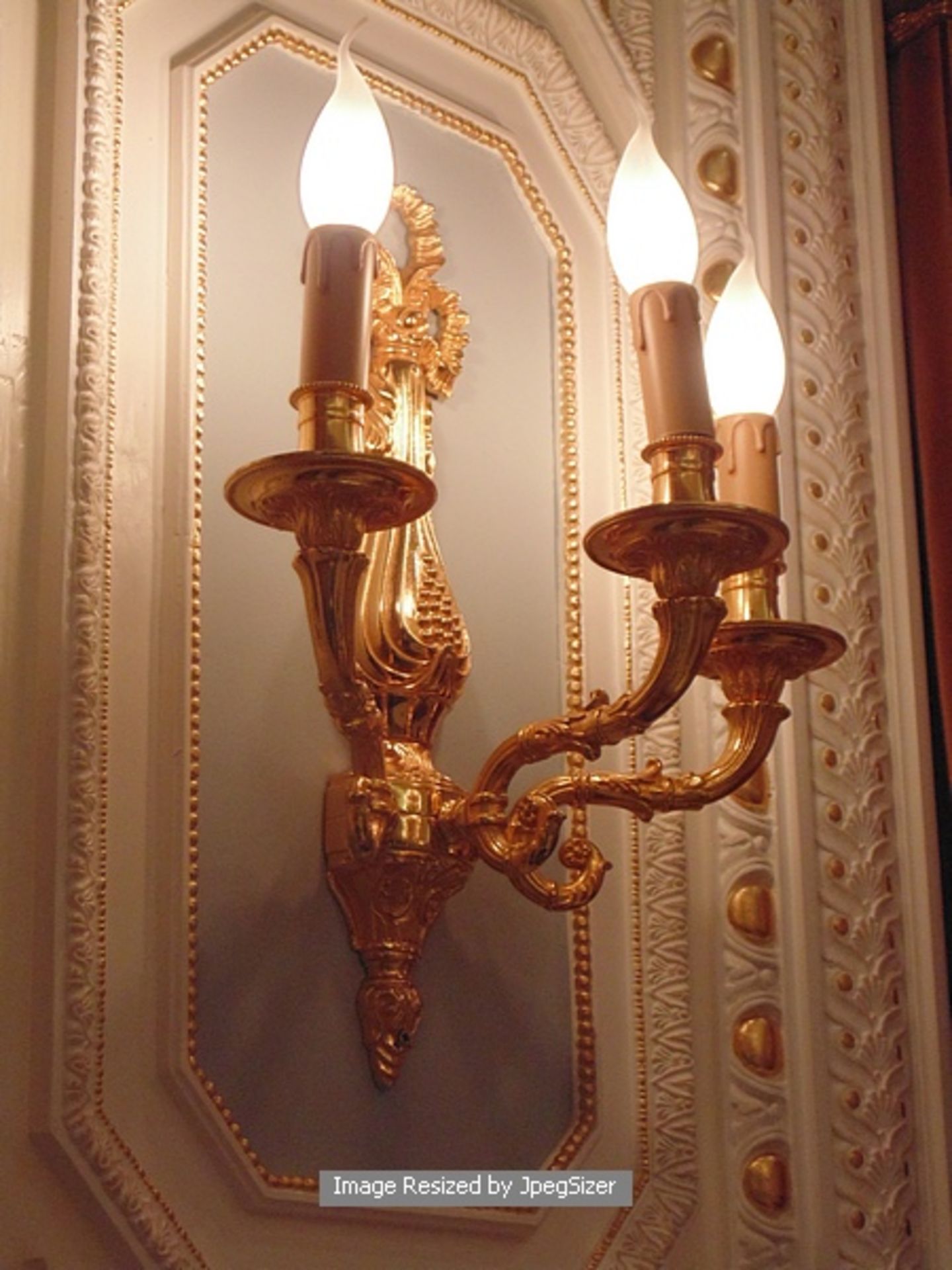 A pair of Laudarte wall sconces three candle wall light, bronze castings gold 24K finish 380mm x
