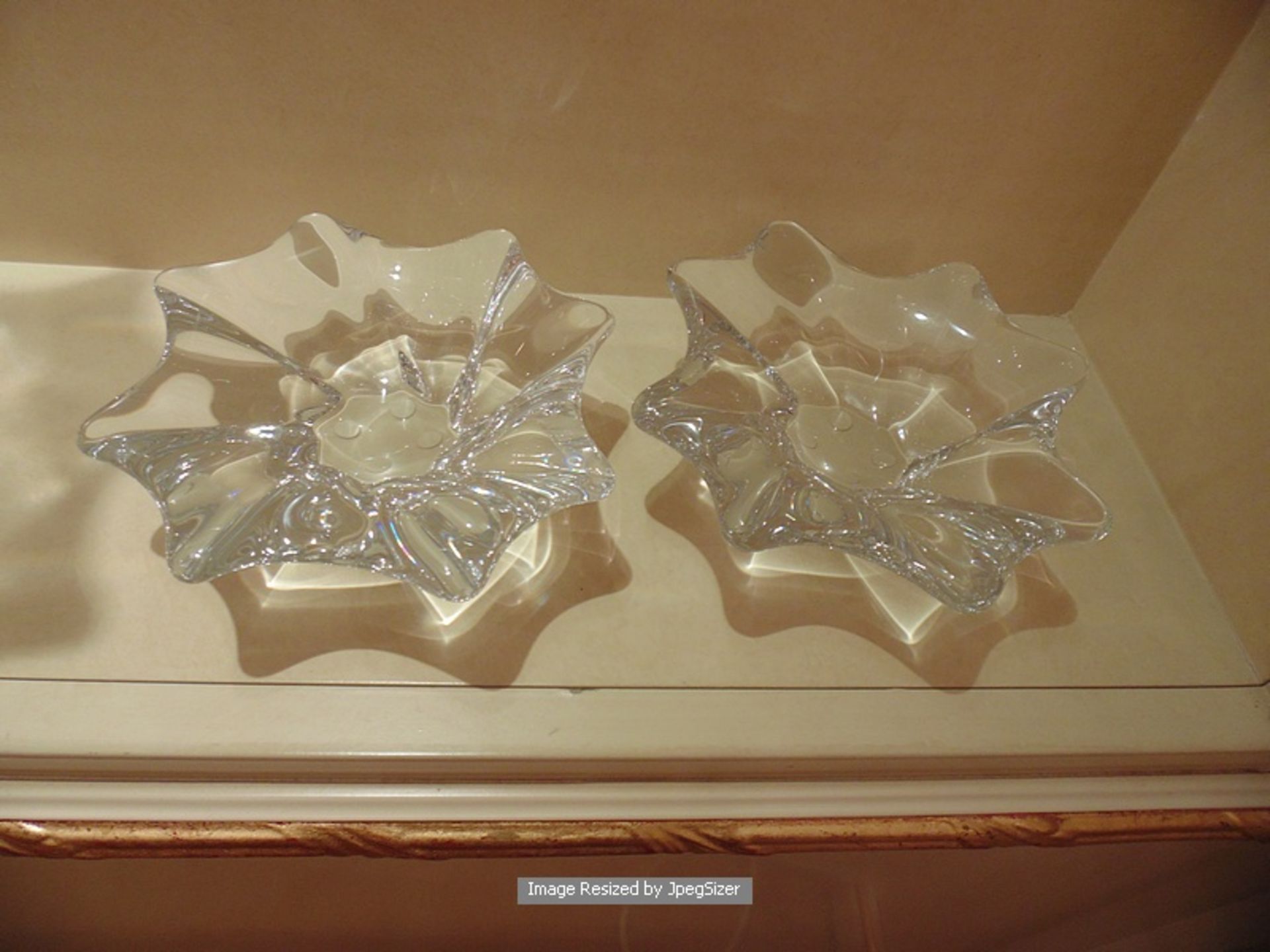 A pair of Baccarat Crystal free-form objet d'art display bowls 150mm x 60mm