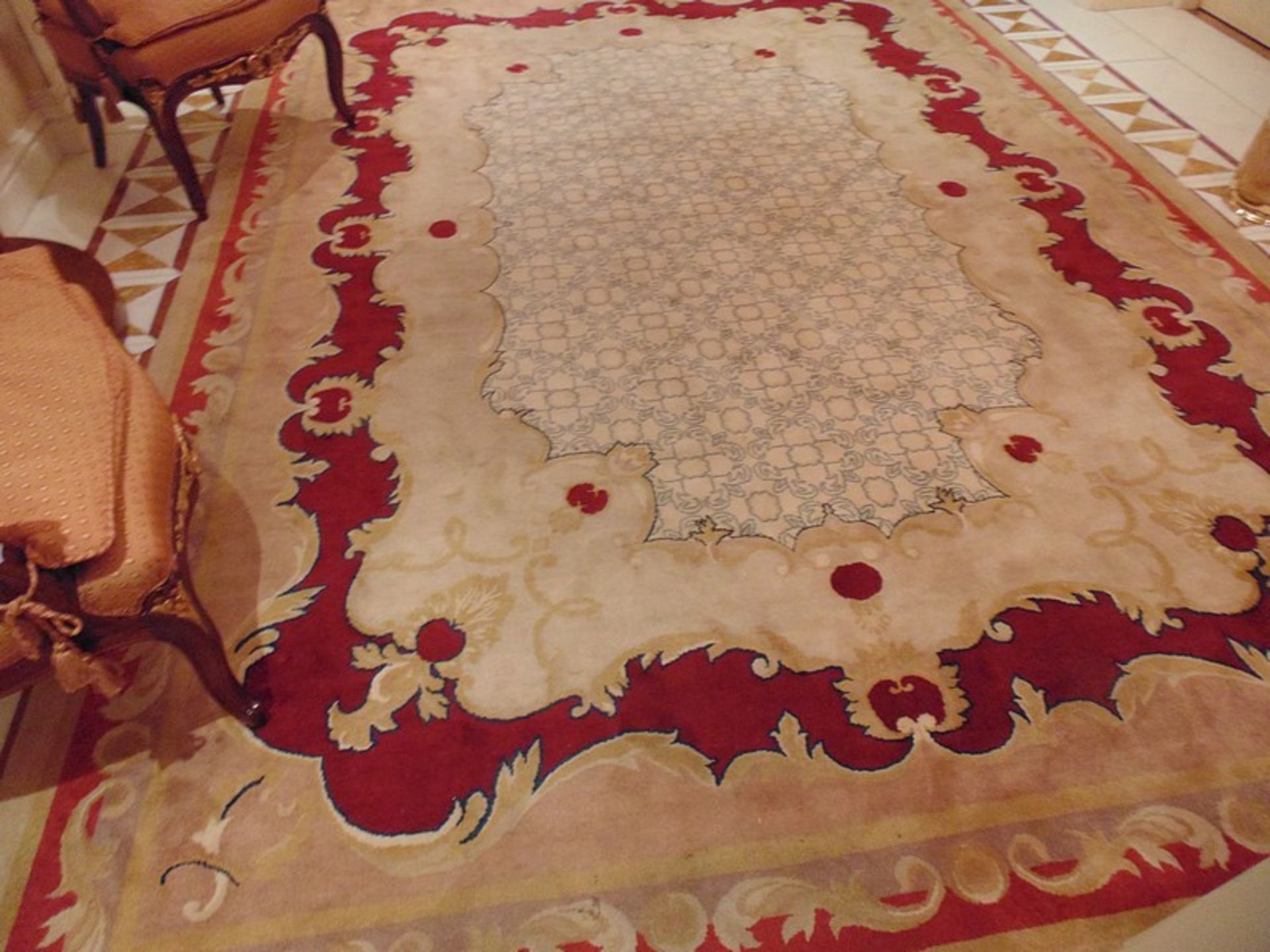 A sumptuous 100% pure new wool carpet 3.49m x 2.51m cream and burgundy field with a central