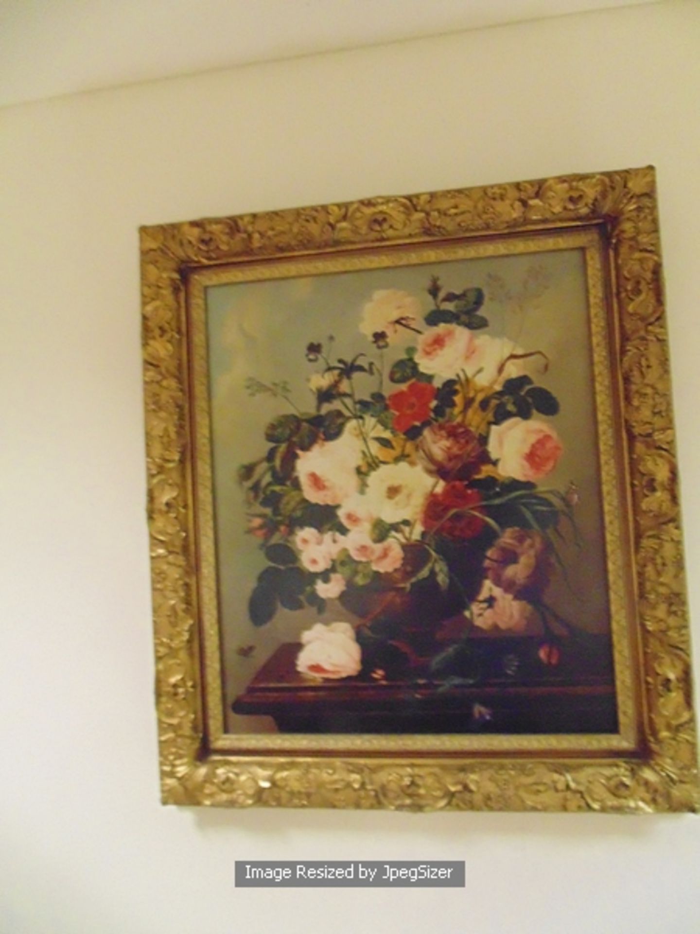 A still life floral painting on canvas gilt painted frame 620mm x 710mm