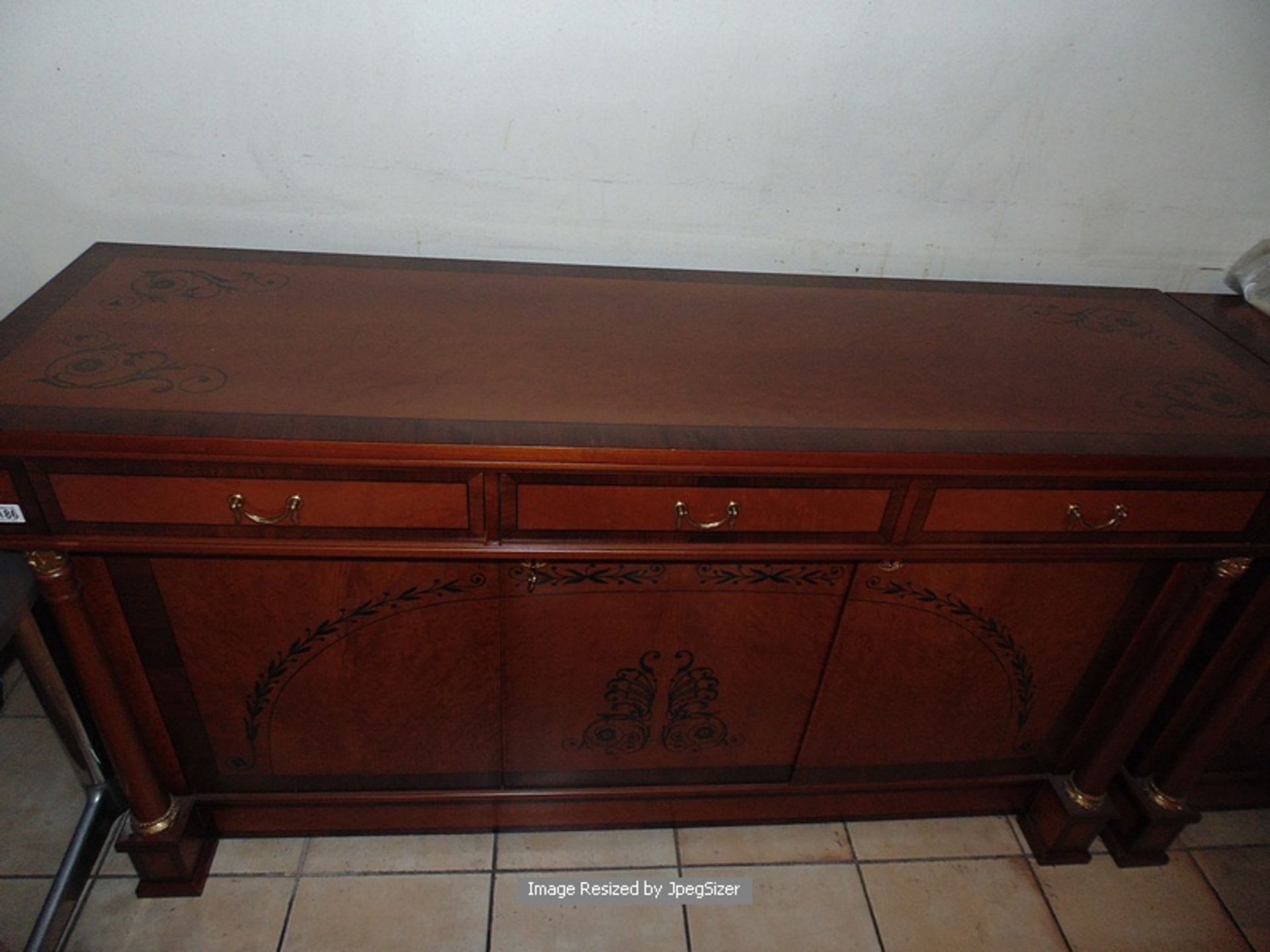 A flame mahogany sideboard in the French Empire style, with fluted quiver terminals, the straight - Image 4 of 5