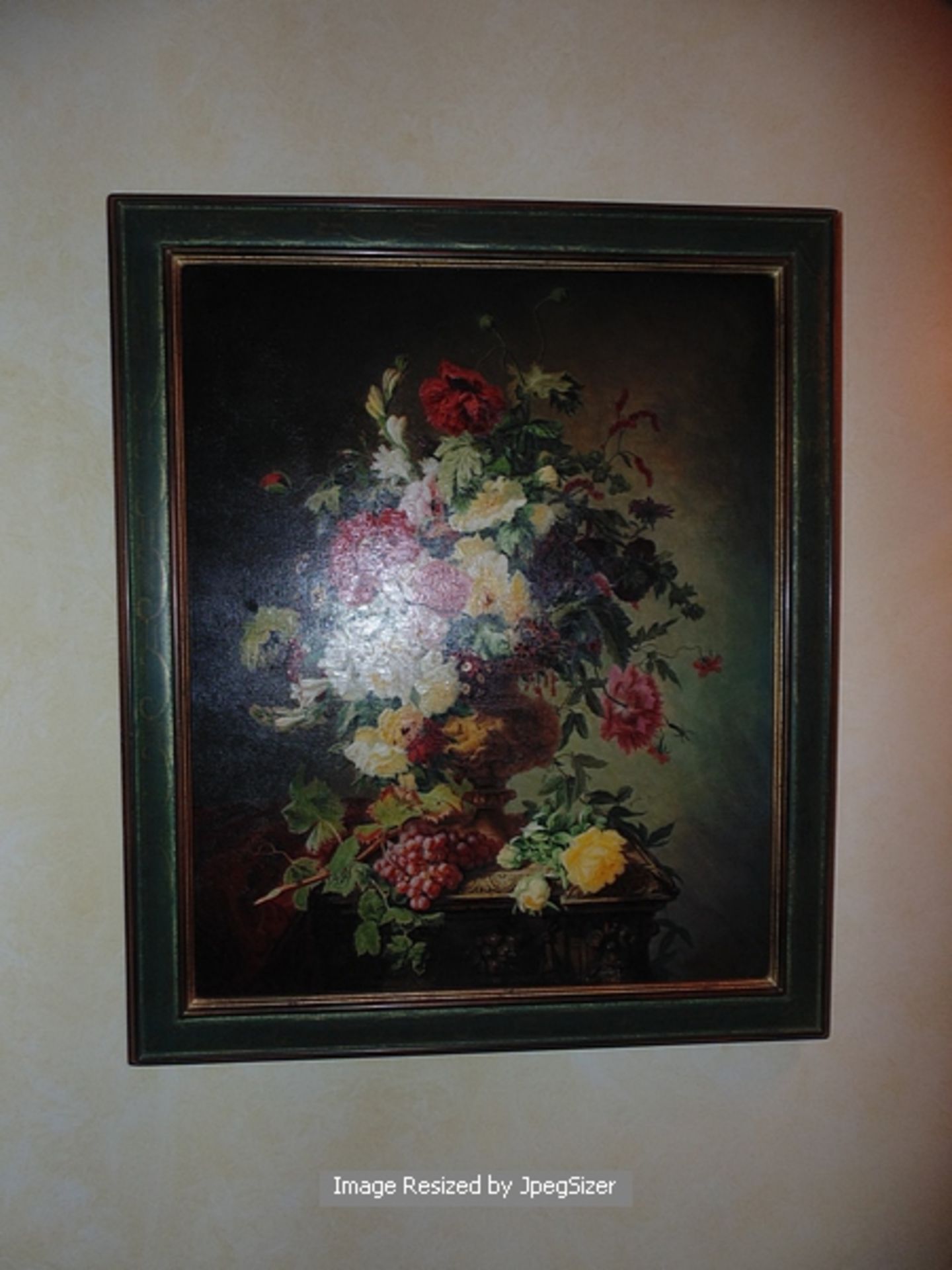 A still life floral painting on canvas gilt painted frame 600mm x 700mm