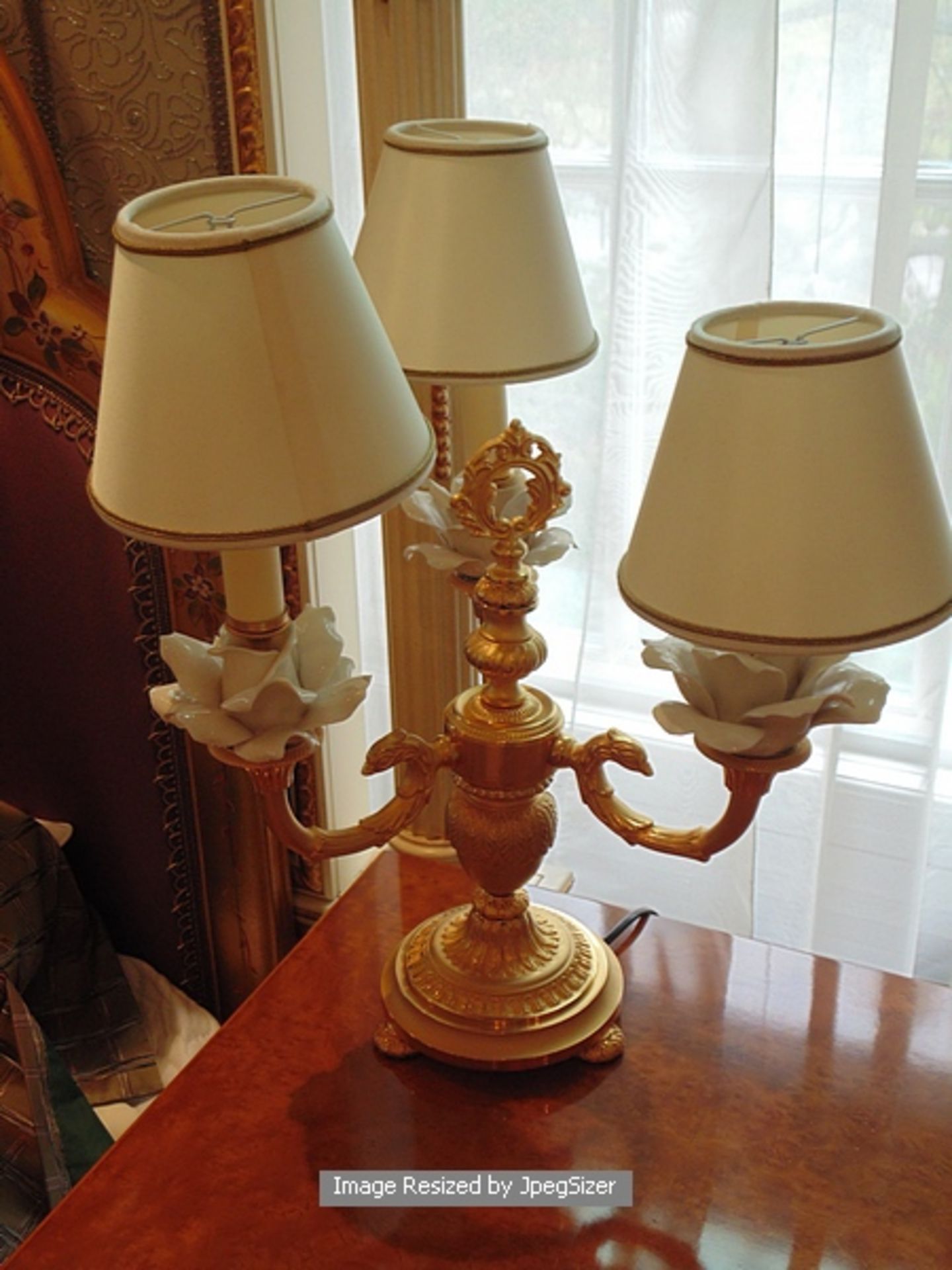 A pair of Laudarte 3 candle ERA table lamps, bronze castings with Capodimonte porcelain rose