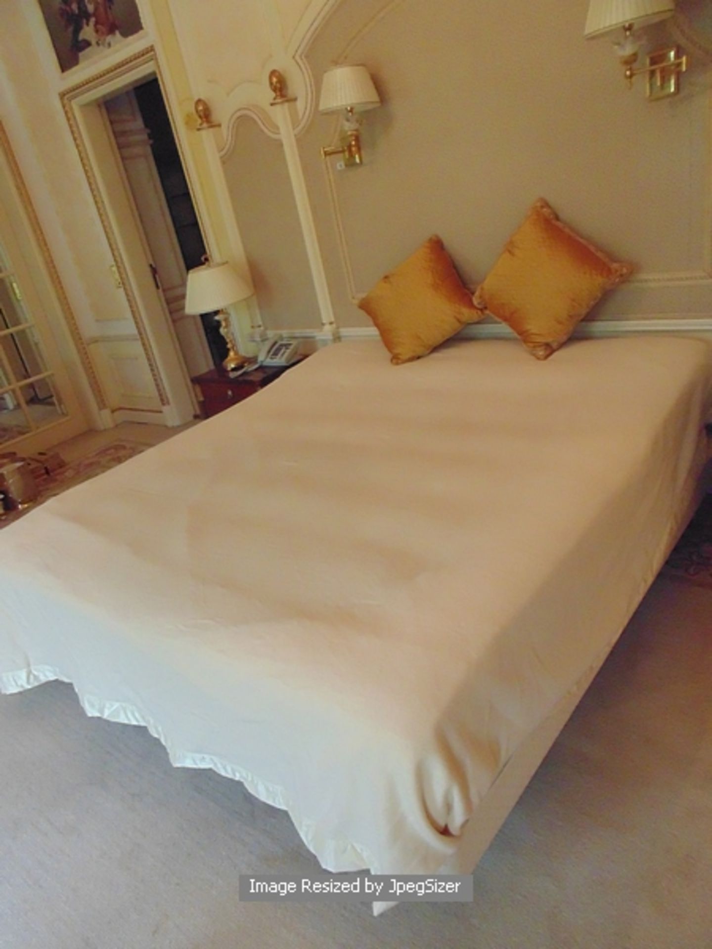 A king size Hypnos base and commercial orthopaedic mattress (no headboard)