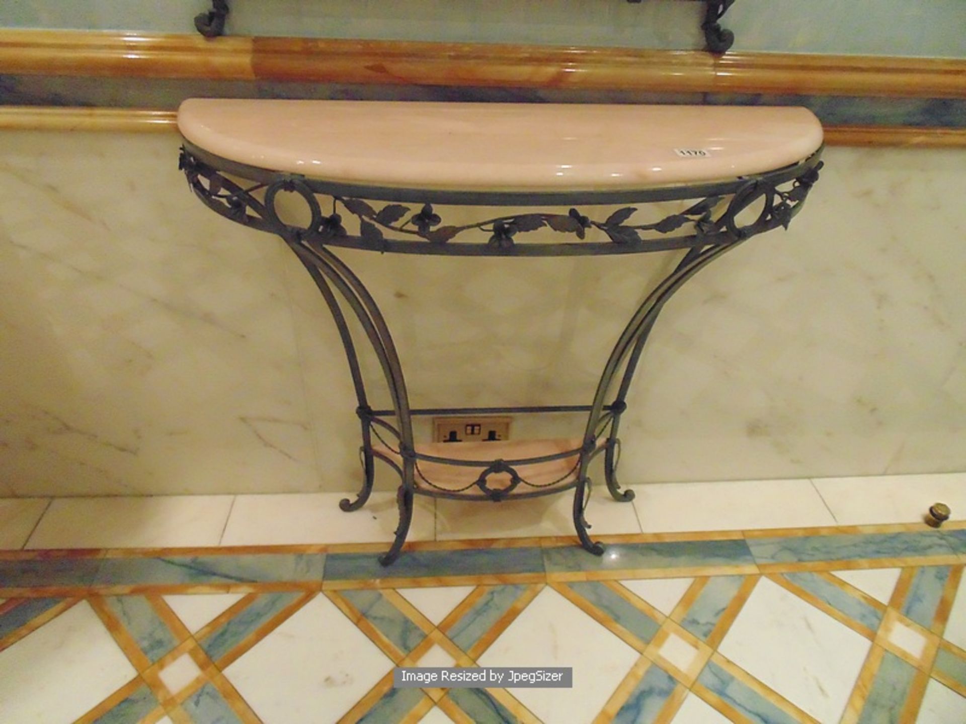 A cast metal embossed demi lune console table with marble top 860mm x 280mm x 800mm