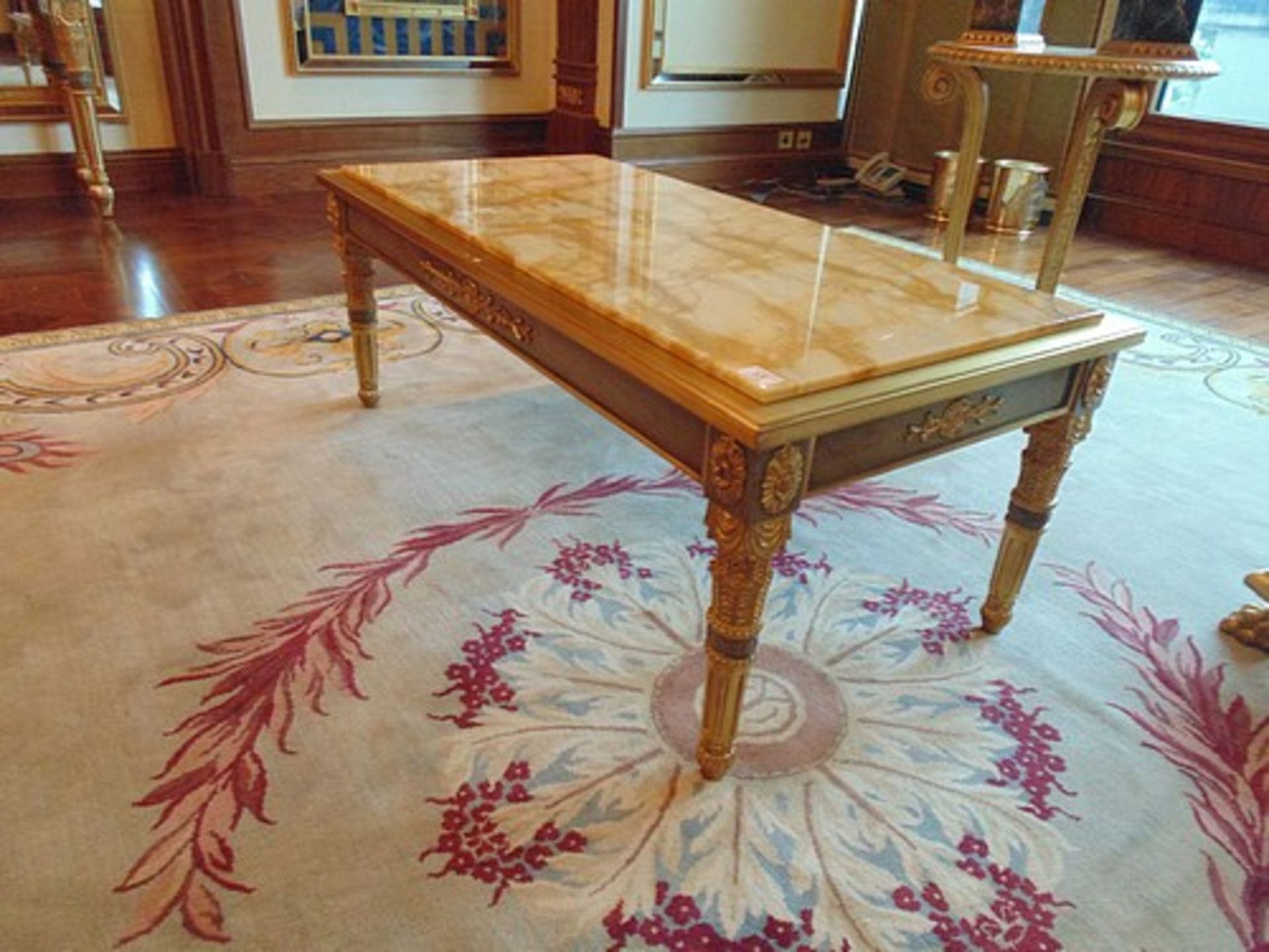 Neoclassical Italian painted and parcel gilt coffee table with marble top, apron decorated with