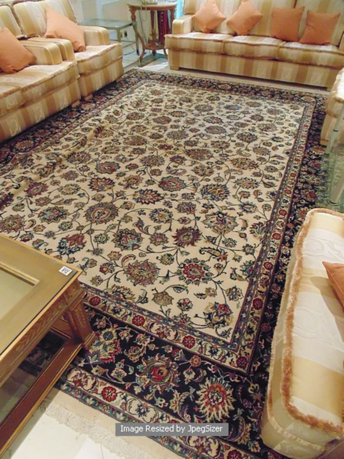 A sumptuous 100% pure new wool carpet 4m x 3m cream field classic with arabesque decoration