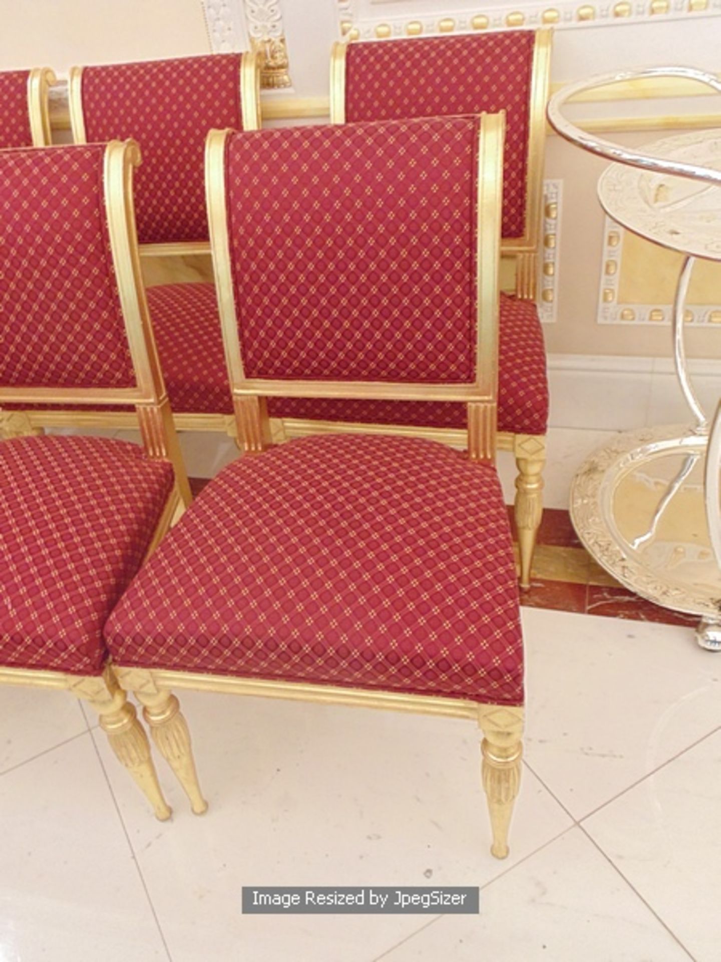 A set of 10 parcel-gilt dining chairs upholstered seat pad and backrest with splayed rear legs and - Image 2 of 3
