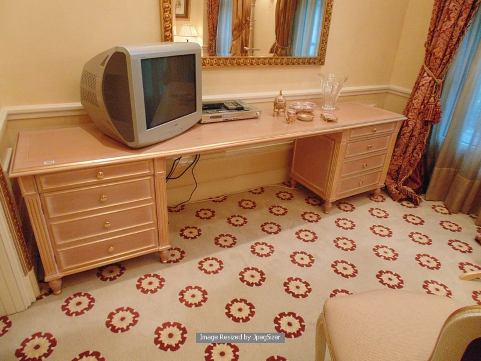 French provincial style desk, painted and gilt, the centre knee-hole flanked by a single pedestal