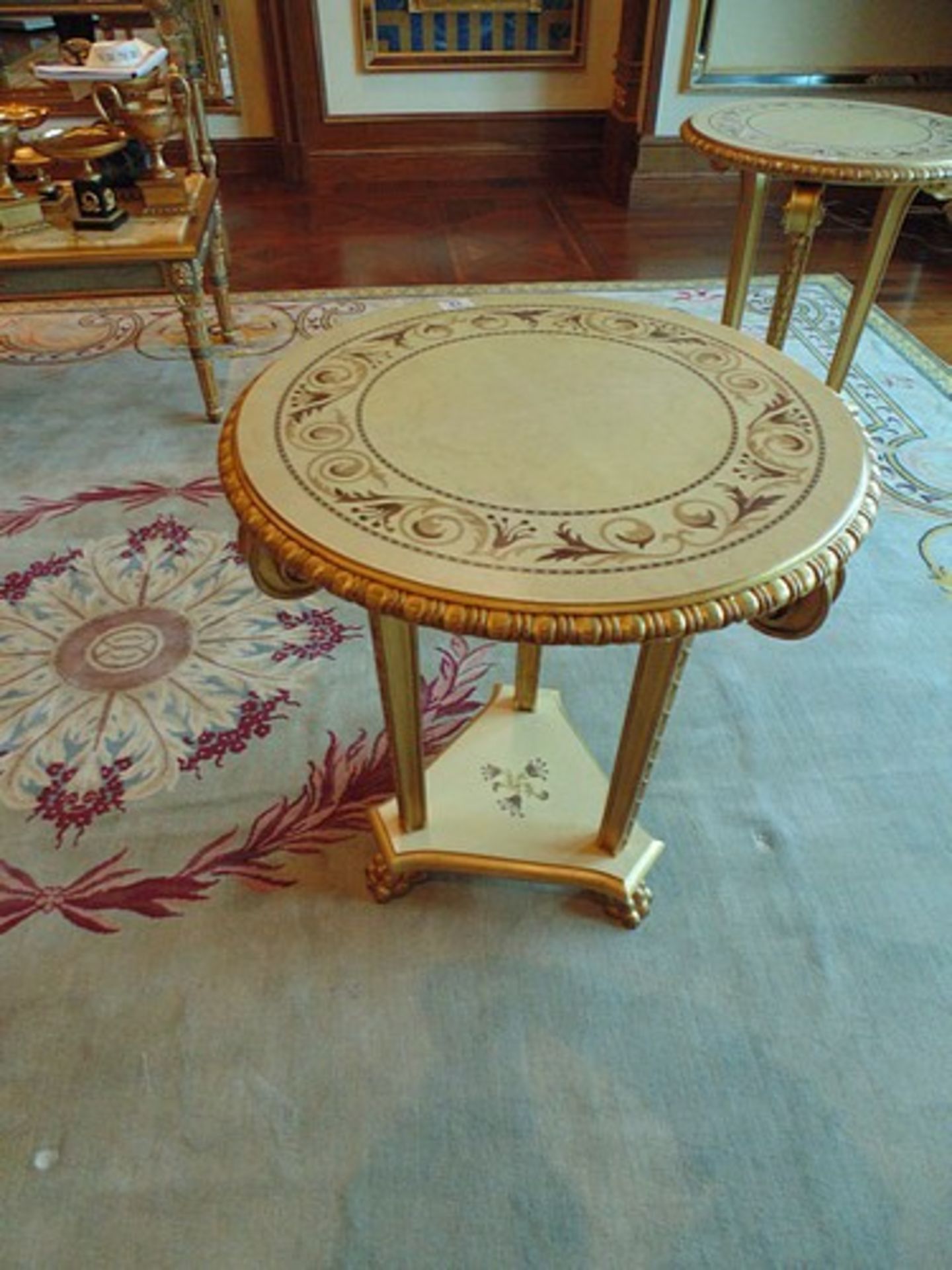 Continental parcel wood centre table 620mm diameter the top with floral motif mounted over three - Image 2 of 3