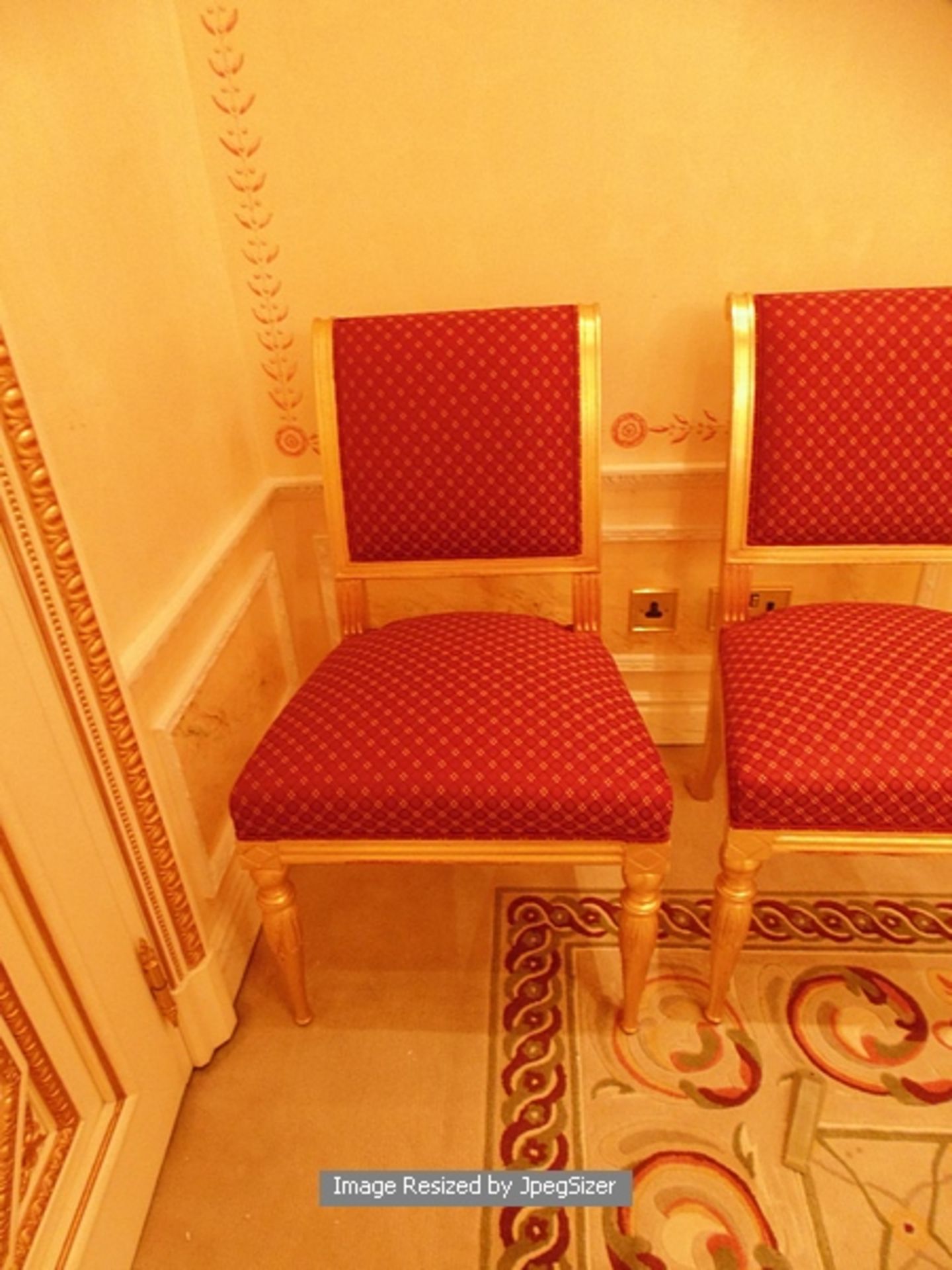 A pair of parcel-gilt dining chairs upholstered seat pad and backrest with splayed rear legs and - Image 2 of 2