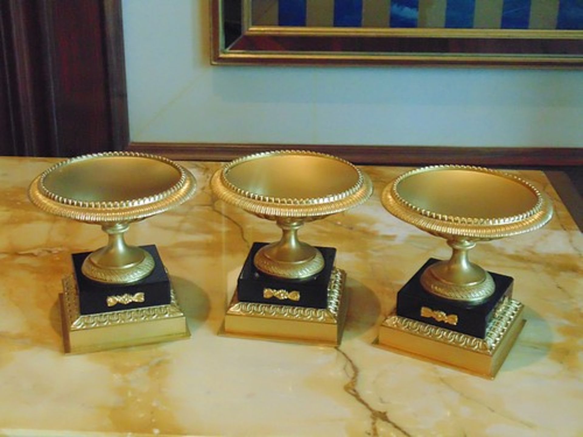 A set of 3 x French Empire style Tazza on marble base, a single gilded bronze mounted on a square