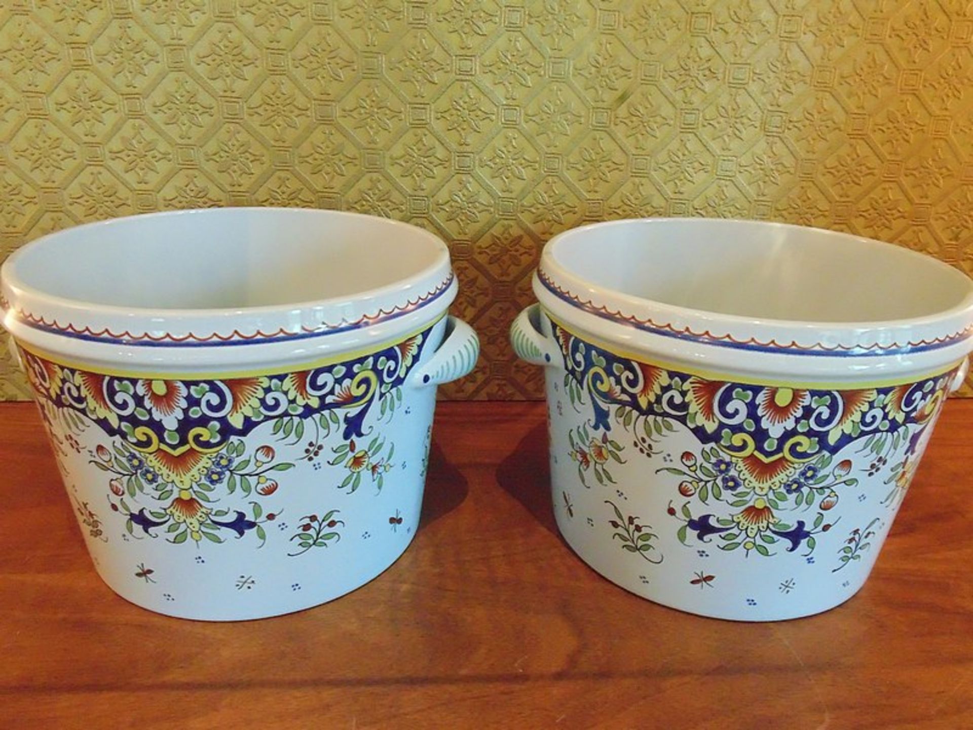 A pair of Fontaine tiled faïence handled pots inscribed Peint à la Main Geo Martel Décoration