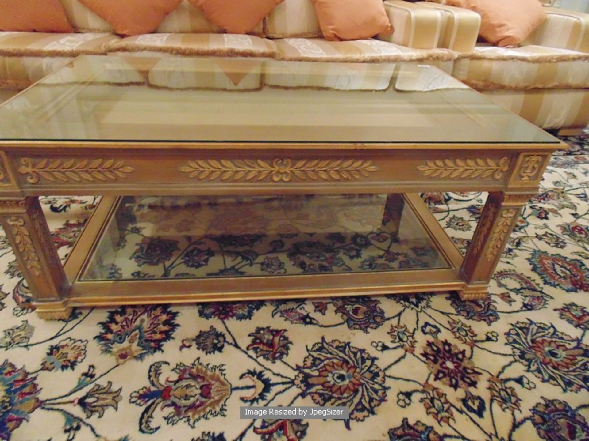 A wood carved coffee table with a centre frieze pull out drawer below a glass inset top with a - Image 2 of 2